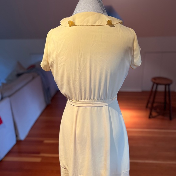 Aritzia wrap dress with flattering ruffle edging. Size 6 in butter yellow - Picture 4 of 6
